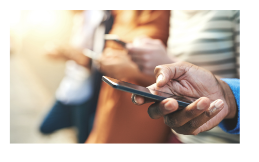 Closeup of a man's hand holding a smartphone