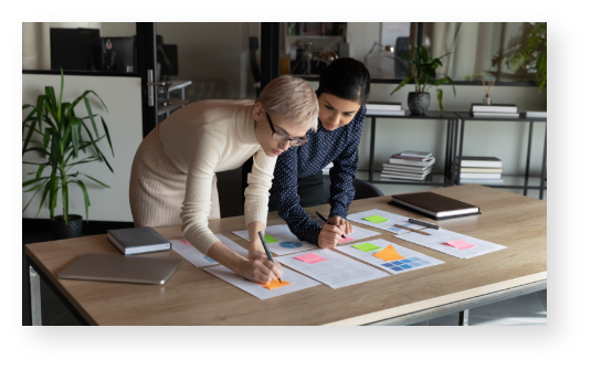 Two women working at a desk